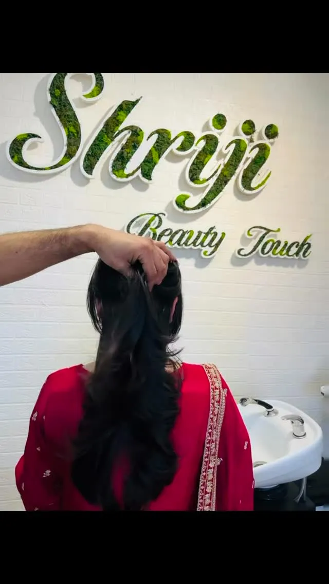 A client from Scotland showing off her long, freshly styled hair